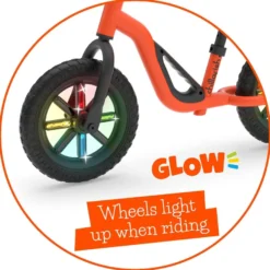 Springcykel Charlie GLOW – Orange (18 mån–4 år)